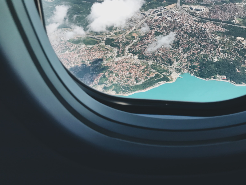 island, city, water, glass - material, 4K, s, transportation, no People, flying, commercial Airplane, transparent, airplane window, day, view, sea, mode of transportation