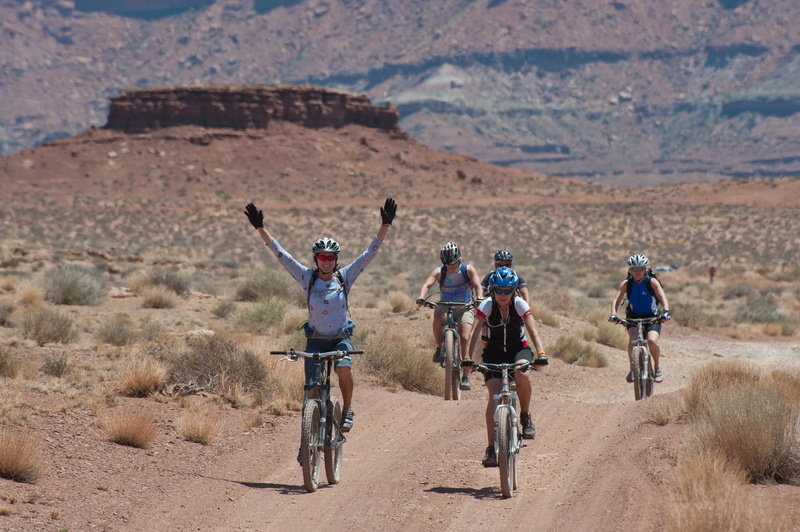 human arm, riding, sport, scenics - nature, mountain, mid adult men, full length, arid climate, formations, ride, canyonlands national park, adventure