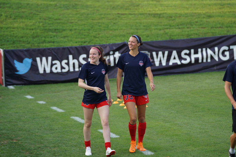 casual clothing, togetherness, competition, front view, grass, ashley hatch, people, sport, 5K, shorts, looking at camera, clothing, real people, text