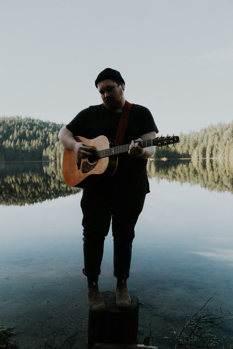 post, wooden, one person, standing, musical equipment, reflection, full length, men, man, leisure activity, casual clothing, water, real people, 5K, front view