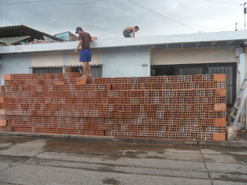 building exterior, building, house, architecture, wall - building feature, day, outdoors, demolition, built structure, people, modification, Construction