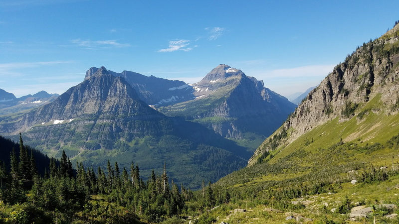 glacier national park, non-urban scene, mountain range, coniferous tree, no people, formation, park, rock, beauty in nature, montana, green color, mountain peak