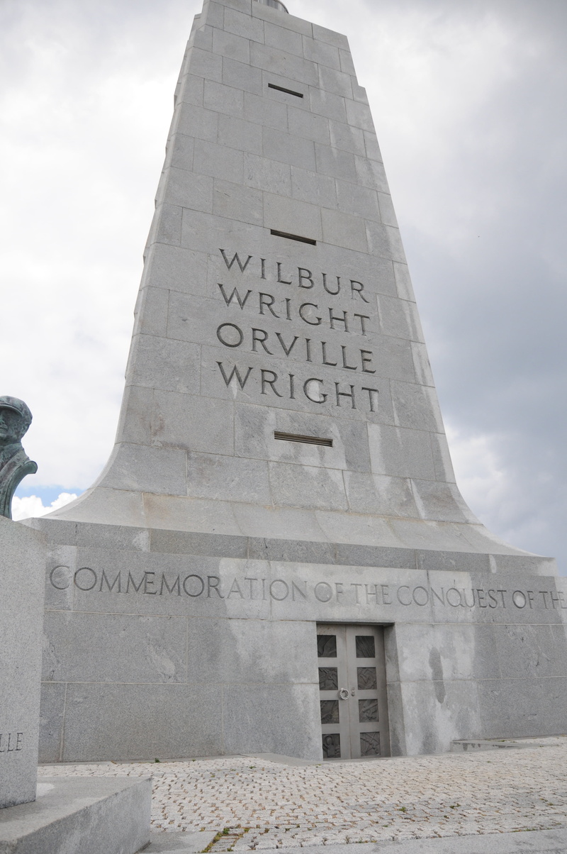 wilbur wright, low angle view, orville wright, art and craft, monument, building exterior, sky, no people, travel, ancient civilization, kitty hawk, travel destinations