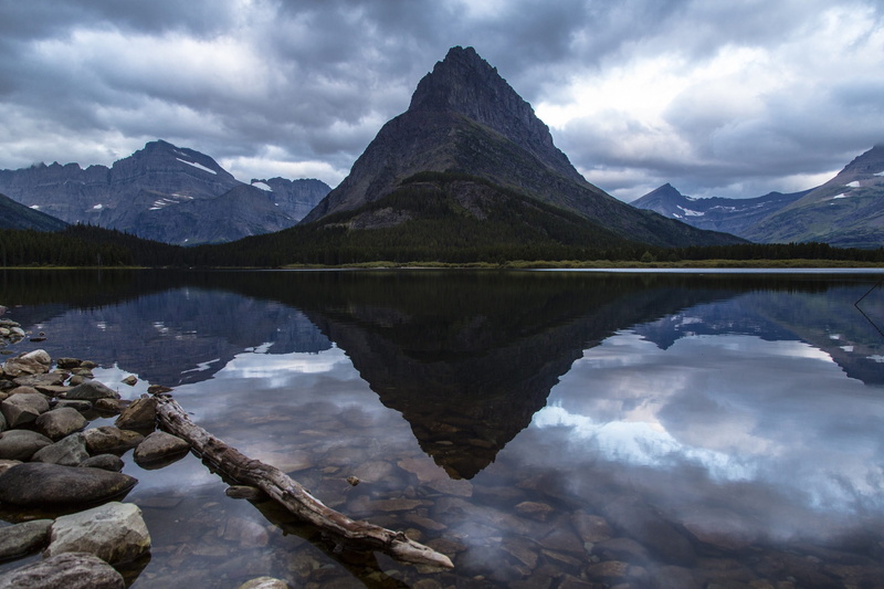 reflection, hills, tranquility, mountain, mountain range, rugged, montana, rock, symmetry, cloud - sky, mountain peak, reflection lake, non-urban scene