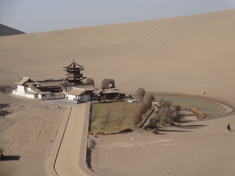dunhuang, spirituality, travel destinations, water, day, religion, arid climate, sea, place of worship, desert, building, sky, built structure, scenics - nature