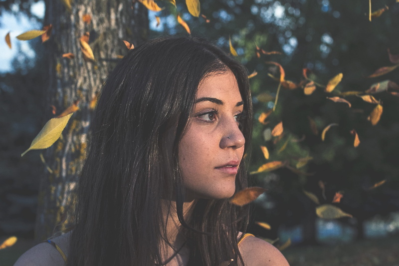 real people, autumn, hairstyle, focus on foreground, old, one person, young women, gorgeous, trees, lifestyles, long hair, beautiful woman, vintage, plant