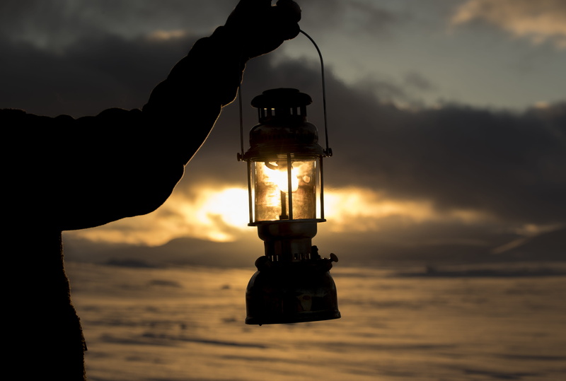 kerosene, cloud - sky, real people, outdoors, nature, sunset, human body part, standing, sky, light bulb, lamp, human hand, 5K, silhouette, lighting equipment