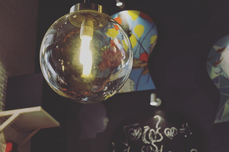 astronomy, decoration, cafeteria, modern, space, universe, holding, crystal ball, bulb, design, colors, planet, nature, egg, body part, light, focus on foreground