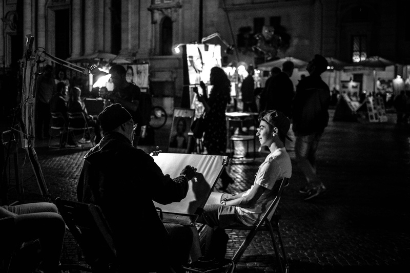adult, medium group of people, group, chair, illuminated, grayscale, night, buildings, photography, crowd, people, table, lighting equipment, near, sitting