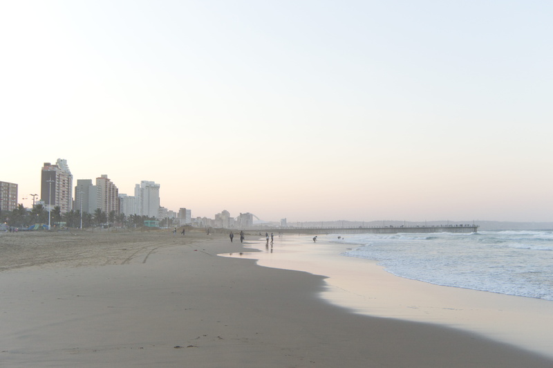 cityscape, swim, building, human, sky, copy space, no people, architecture, sunset, city, scenics - nature, built structure, outdoors, ocean, shoreline