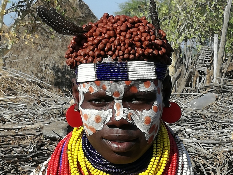 ethiopia, men, looking at camera, young men, leisure activity, obscured face, one person, ethnicity, human face, karo, adult, tribe, day, africa, headshot
