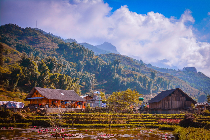 grassland, farm, house, near, beauty in nature, landscape, mountains, grass, houses, country, surrounded, bungalow, clouds, outdoors, barn, traditional