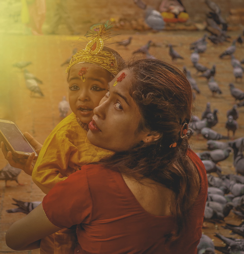 home interior, cute, photography, focus on foreground, bird, mouth open, carrying, photo, clothing, childhood, real people, 2K, festival, crowd, looking