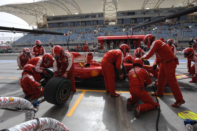 group of people, large group of people, men, gp, protection, uniform, protective workwear, bahrain, ferrari, crowd, real people, f, red, adult, teamwork