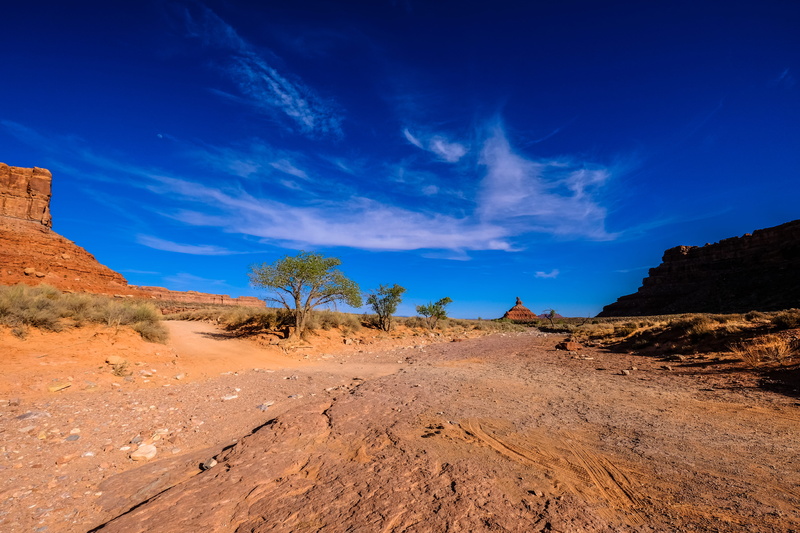 tranquility, rock, sky, sand, environment, dirt road, scenics - nature, road, dune, no people, semi-arid, day, blue, arid climate, plateau, building, ground