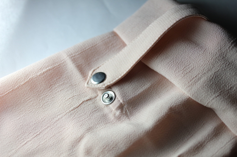 button, adult, clothing, bi, ring, body part, ata, human body part, textile, personal accessory, jewelry, closed, metal, arts culture and entertainment