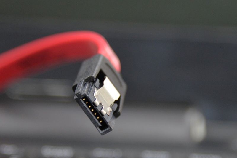 s-ata, no people, focus on foreground, indoors, single object, connection, close, electric plug, red, electrical equipment, photo, sata, network connection plug
