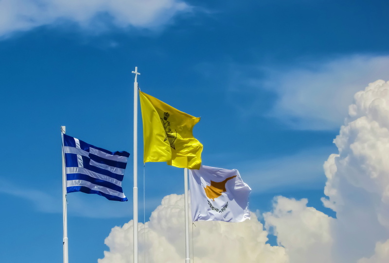 environment, greece, low angle view, outdoors, symbol, nature, day, motion, clouds, blue, 2K, yellow, sunlight, country, no people, pole, patriotism, wind