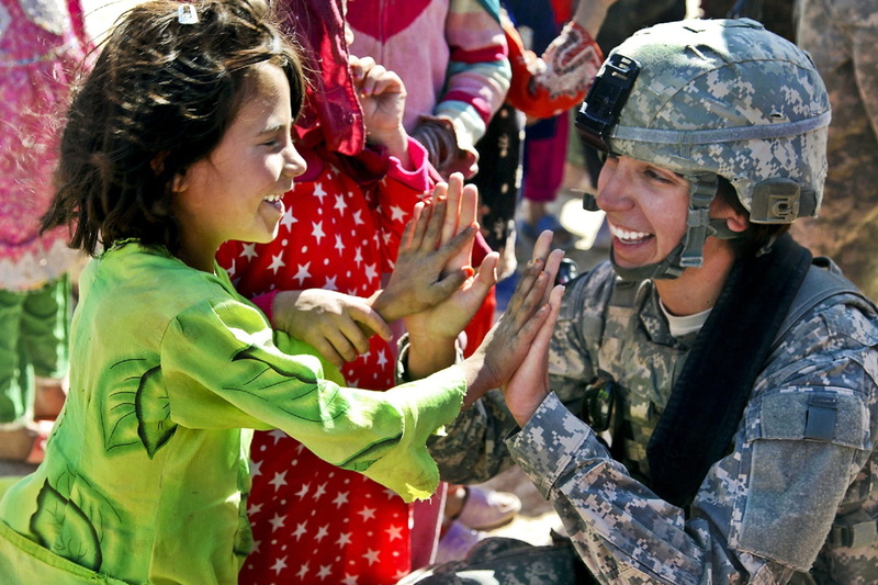 cheerful, mid adult, usa, woman in green, beige, america, long, woman, soldier, ethnicity, positive emotion, men, bonding, day, enjoyment, child, incidental people