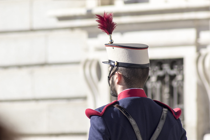 one man only, madrid, outdoors, men, rifle, focus on foreground, Madrid, parade, defense, army, red, standing, combat, shotguns, industry, building exterior