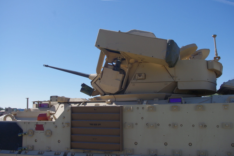 miltary, no people, sunlight, 2K, building exterior, armored Tank, war, national guard, architecture, National Guard, transportation, blue, security, mode of transportation