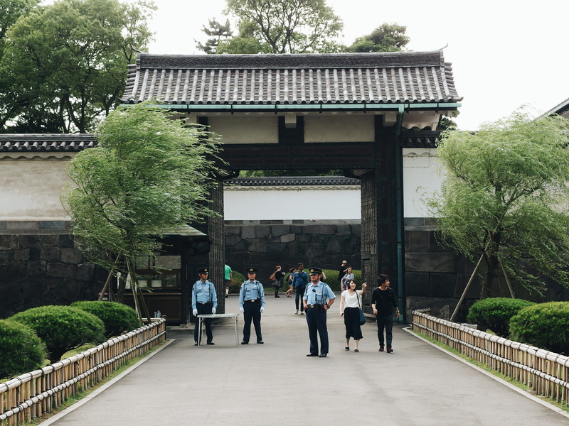 police, men, architecture, imperial palace, visit, outdoors, palace, nature, building, adult, women, asia, tokyo, built structure, japan, tree, religion