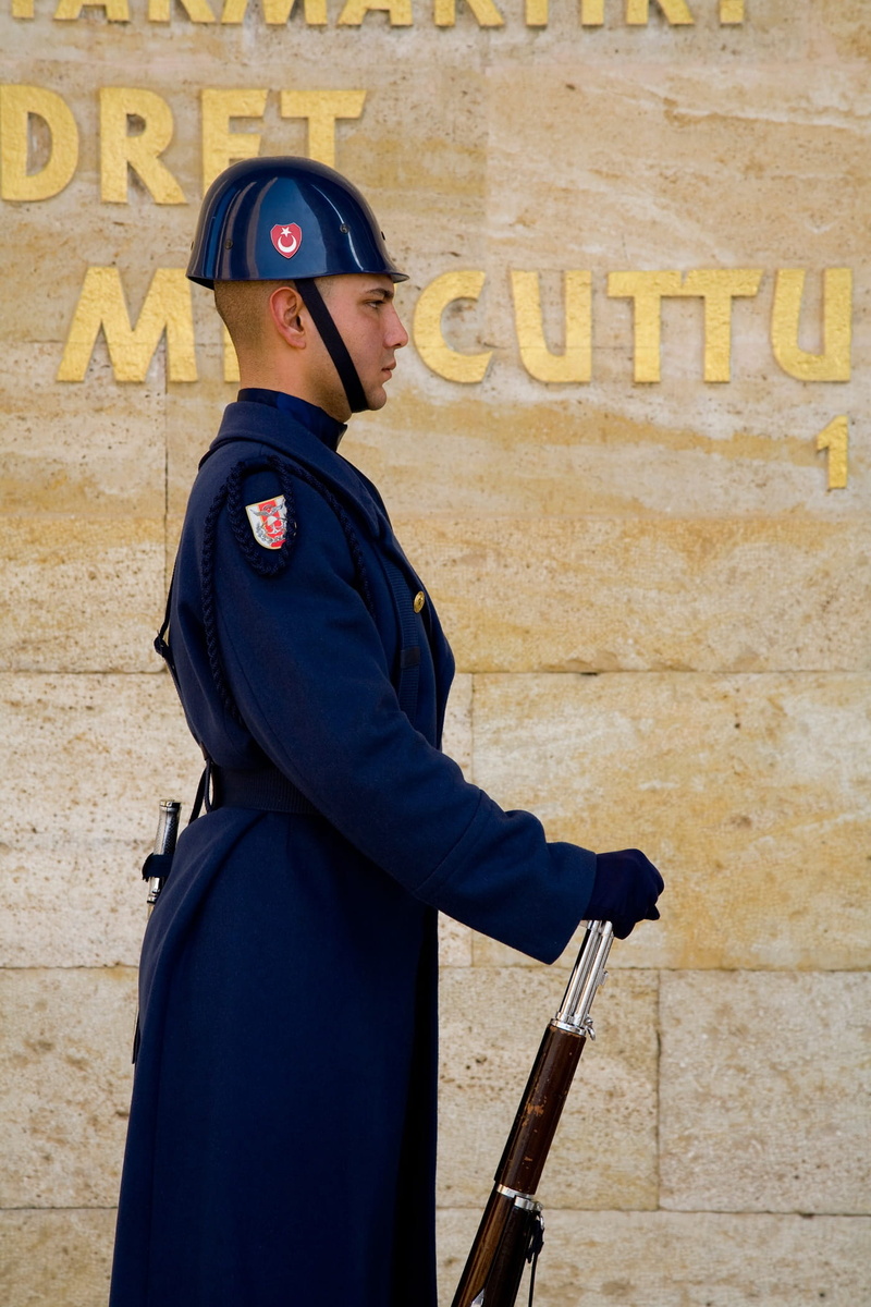 waist up, atatürk, day, uniform, respect, side view, 1080P, one person, western script, mausoleum, looking, standing, built structure, young adult, real people