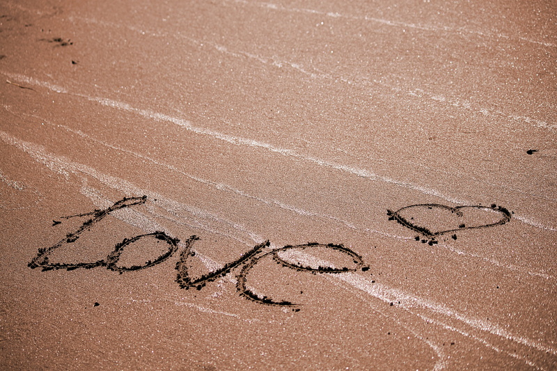 sunlight, emotion, creativity, capital letter, sand, western script, positive emotion, nature, conceptual, brown, ocean, text, message, love, communication