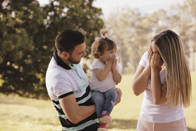 real people, polo, daughter, leisure activity, photoshoot, positive emotion, childhood, casual clothing, outdoors, daylight, parents, happiness, smile
