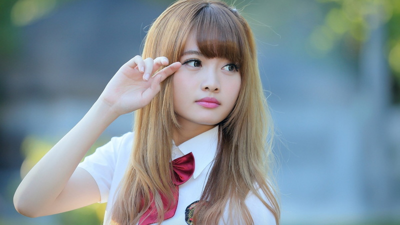 front view, hair, lifestyles, Asian, focus on foreground, blonde, portrait, bangs, women outdoors, teenager, makeup, looking away, leisure activity, depth of field
