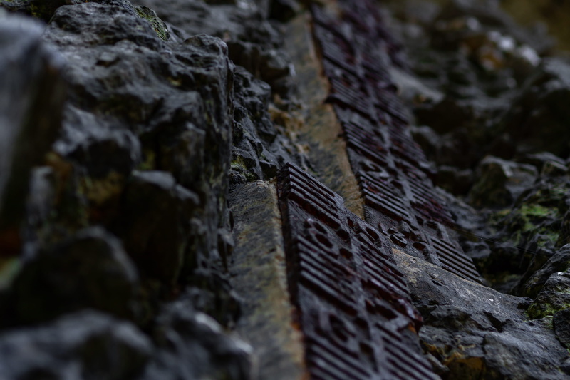 digits, france, mountain, damaged, textured, crag, built structure, backgrounds, outdoors, sorguemetre, close-up, focus on foreground, solid