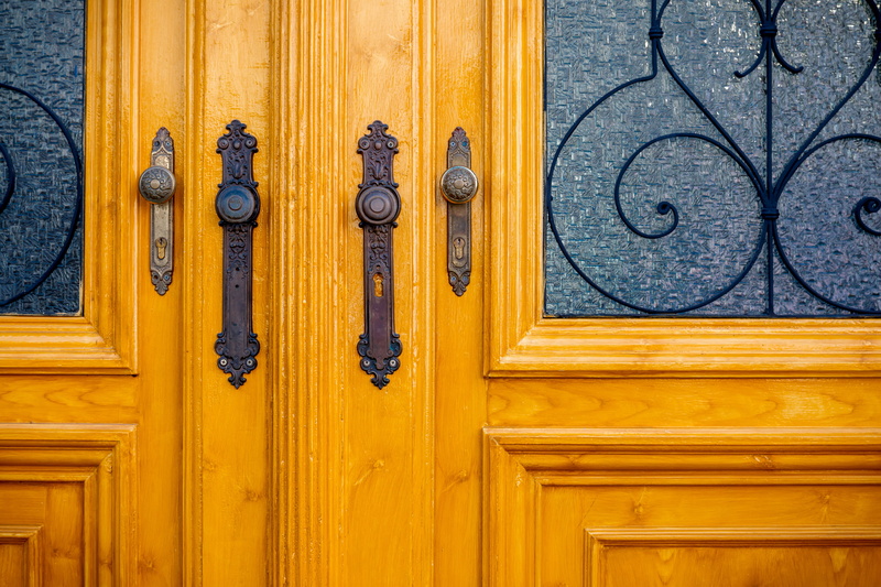 yellow, safety, ornate, detail, wooden, 4K, doorknob, handle, closed, wood - material, built structure, entrance, doors, historic, building, day, building exterior