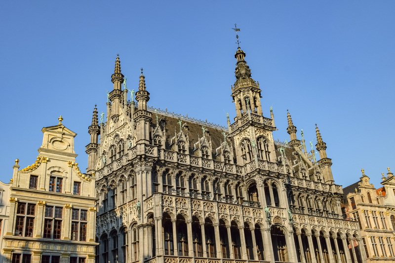 travel destinations, tower, government, europe, belgium, building exterior, clear sky, the past, city, sky, gothic style, ornate, history, tourism, place of worship