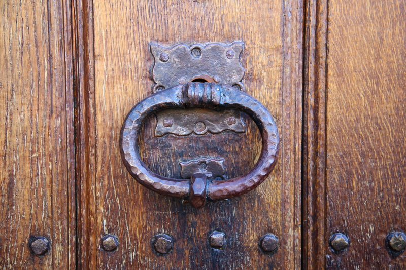 security, cat, lion - feline, door handle, carving, entrance, craft, door knocker, day, wood grain, representation, brown, no people, full frame, metal