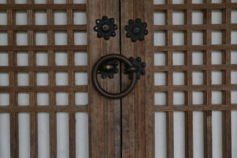 indoors, door knocker, safety, full frame, republic of korea, shape, closed, no people, knob, day, entrance, close-up, korean traditional, moon, design