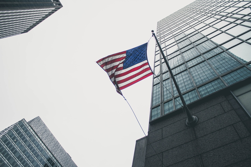 low angle view, skies, sky, tall - high, 5K, patriotism, america, flag of U.S.A., skyscraper, clear sky, striped, office, american Flag, gray, wind, uSA