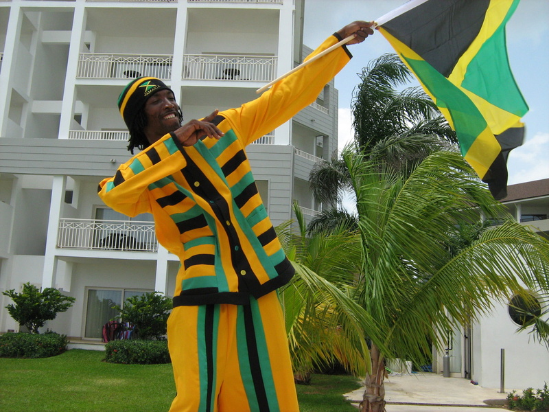 happiness, built structure, arms raised, standing, photos, leisure activity, day, Man, one person, lifestyles, public domain, plant, Jamaican, tree, smiling