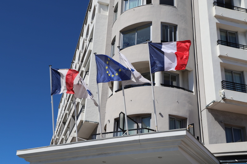 no person, apartment, cannes, outdoor, architecture, glass, office, building exterior, freedom, patriotism, national icon, wind, clear sky, sky, radisson