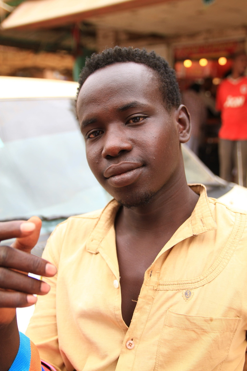 head, street, lifestyle, outdoor, men, city, real people, one person, lifestyles, happy, adult, man, sudanese, traditional, portrait, muslim, person, front view