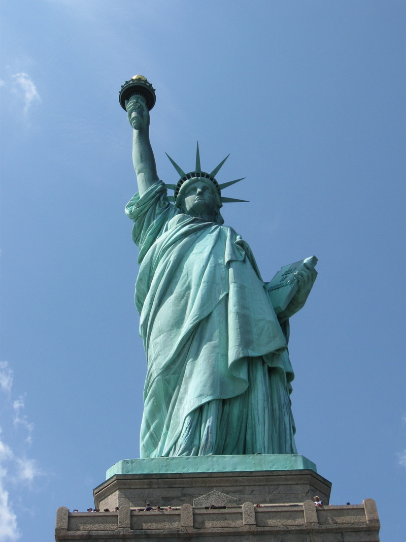 architecture, travel destinations, flaming torch, representation, art and craft, sculpture, low angle view, statue of liberty, tourism, day, america, human representation