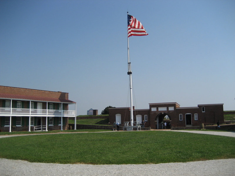 no people, patriotism, environment, 2K, Flag, outdoors, government, building, built structure, plant, sky, day, wind, Baltimore, pride, grass, architecture