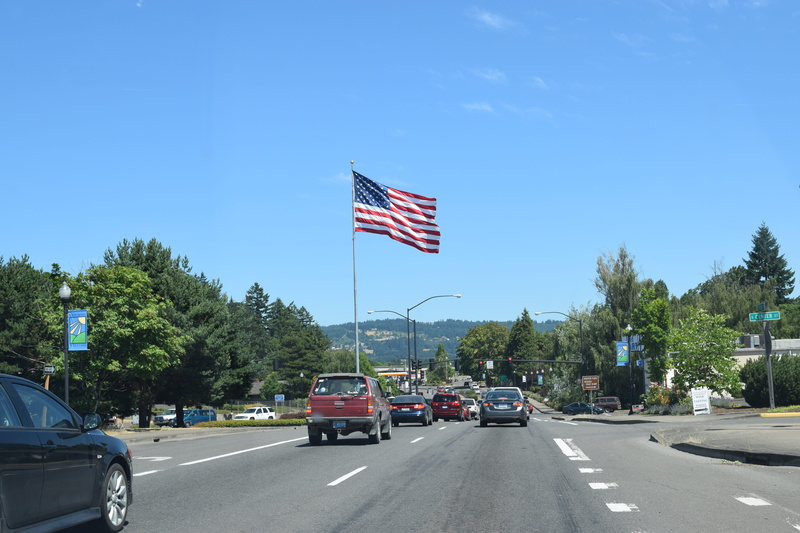 fourth july, street, car, sky, red, star spangled banner, motor vehicle, land vehicle, patriotism, travel, mode of transportation, stars and stripes, tree