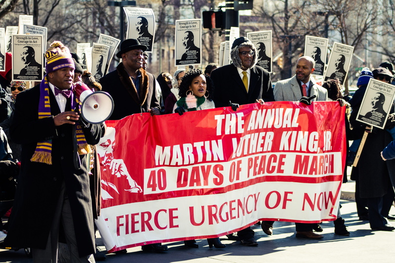 rallying, holding, outdoors, western script, architecture, real people, crowd, mlk, built structure, march, 5K, script, non-western script, daytime, martin luther king jr