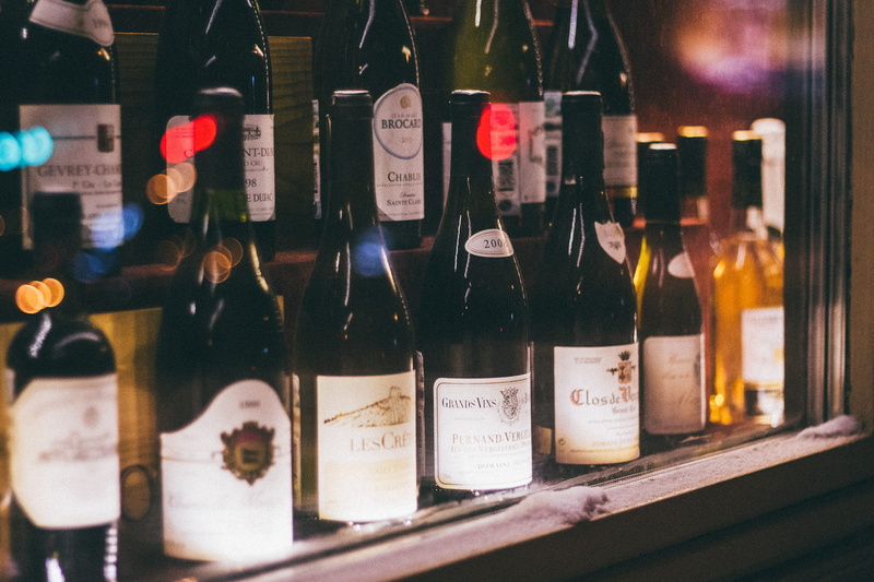 indoors, wine bottle, bottle, luxury, building, beverage, liquor, bottles, no people, liquor store, urban, bar counter, wine, town, retail, label, container
