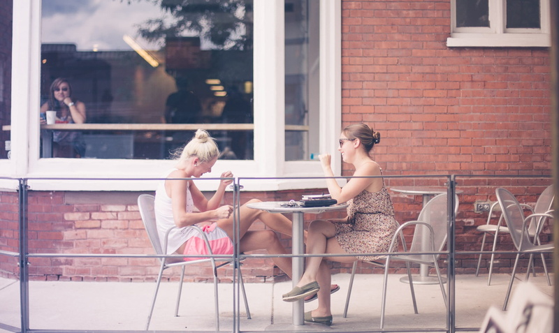 building exterior, two people, dining, girl, beautiful woman, seat, patio, set, adult, beside, 1080P, reflection, hairstyle, restaurant, fashion, house
