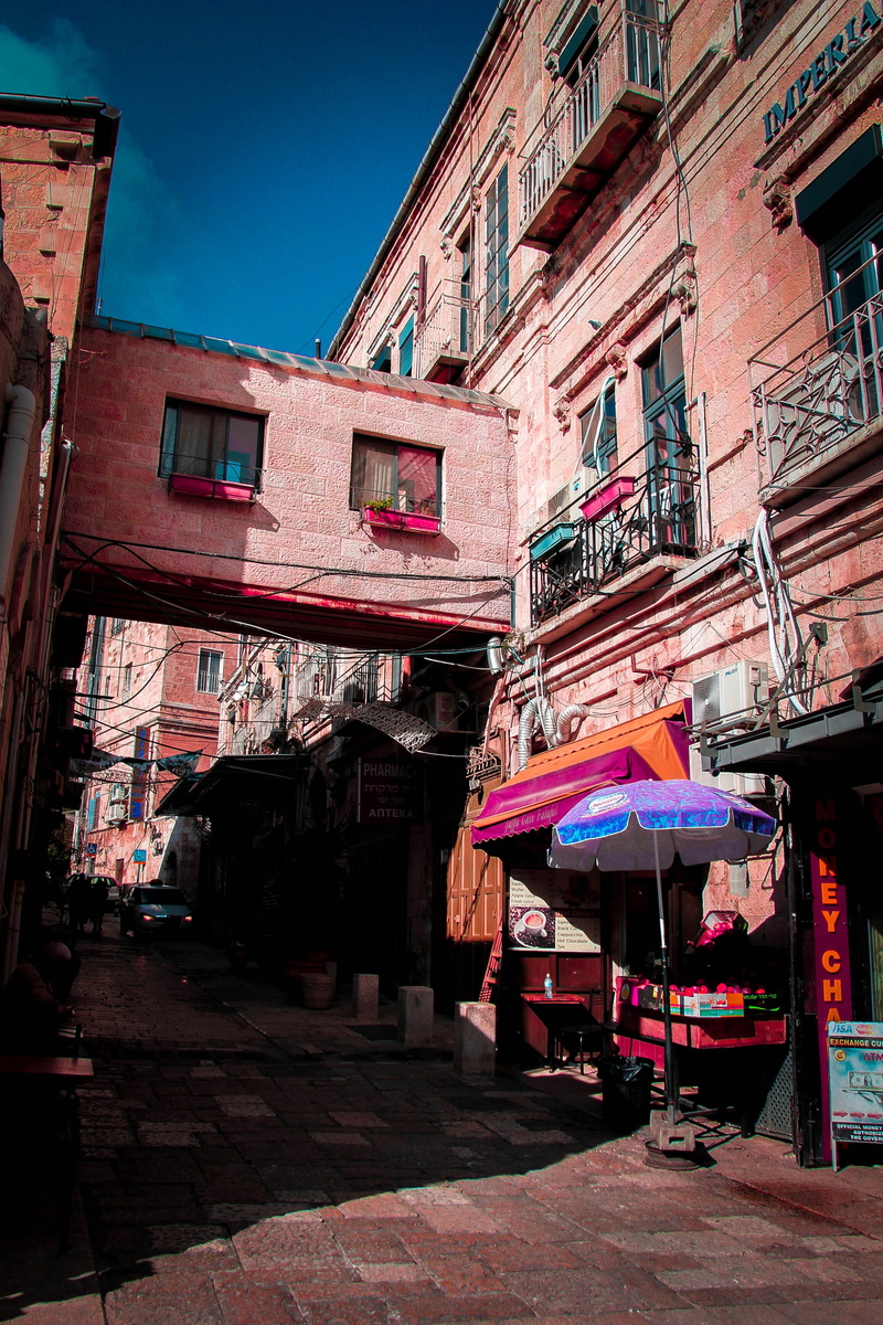 walkway, street, urban, market, street market, non-western script, built structure, day, sky, outdoors, town, incidental people, architecture, vehicle