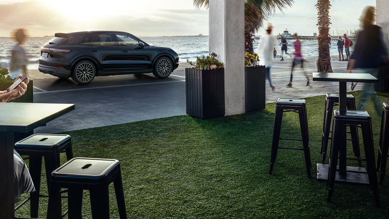 city, chair, motor vehicle, land vehicle, car, day, cafe, outdoors, incidental people, road, restaurant, real people, seat, mode of transportation, sunlight