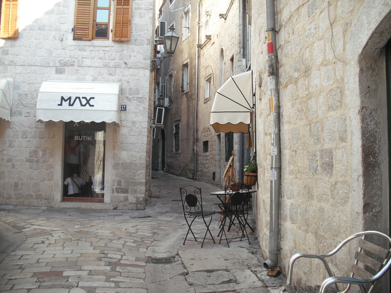 communication, old, city, table, day, window, cafe, text, built structure, no people, urban Scene, building exterior, kotor, western script, travel, 2K