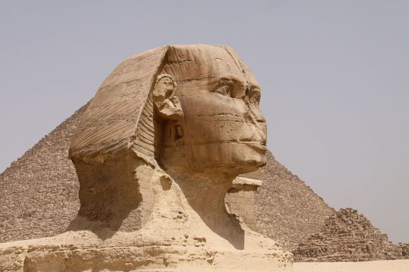 clear sky, sculpture, ancient history, human representation, ancient civilization, desert, travel, craft, sphinx, solid, great, architecture, nature, sky