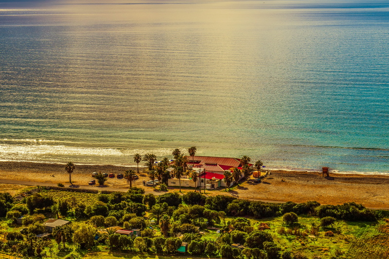 beach, sea, high angle view, plant, beauty in nature, scenery, land vehicle, group of people, growth, morning, serenity, mode of transportation, cyprus
